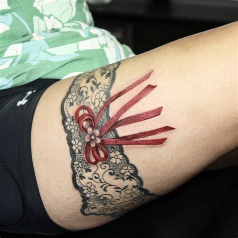 Mar 1, 2019 - Explore Bkdbchooppell's board "lace garter tattoos" on Pinterest. See more ideas about lace garter tattoos, tattoos, garter tattoo.